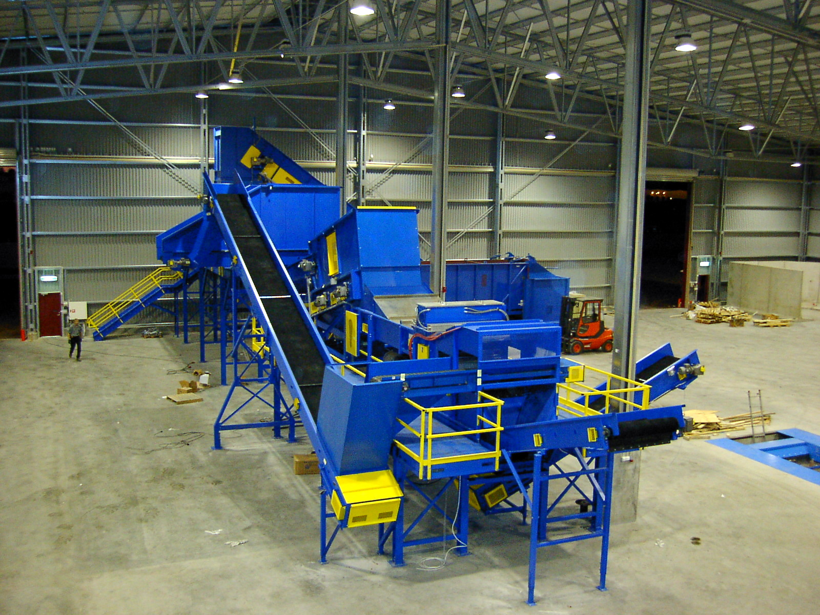 Turn-key optical sorting conveyor system built to integrate with a customer computerized sorting line